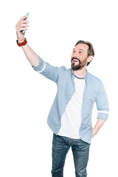istock man taking selfie with smartphone 866195392