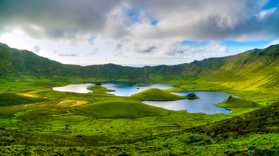 Paisaje al atardecer vista al cráter del Caldeirao, isla de Corvo, Azores, Portugal photo