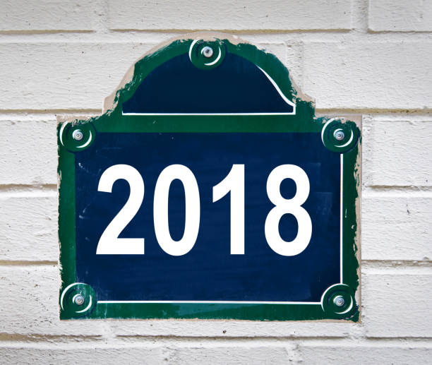 istock 2018 written on a Paris street plate isolated on white background 866200288