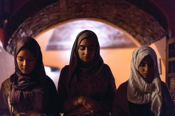 istock Young Muslim Women praying 866200378