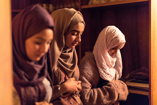 Young Muslim Women praying