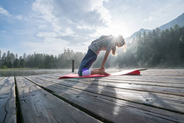 istock Yoga training, girl exercising 866201368