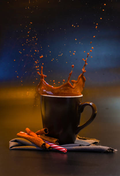 istock Splash of a cup brown of coffee 866203980