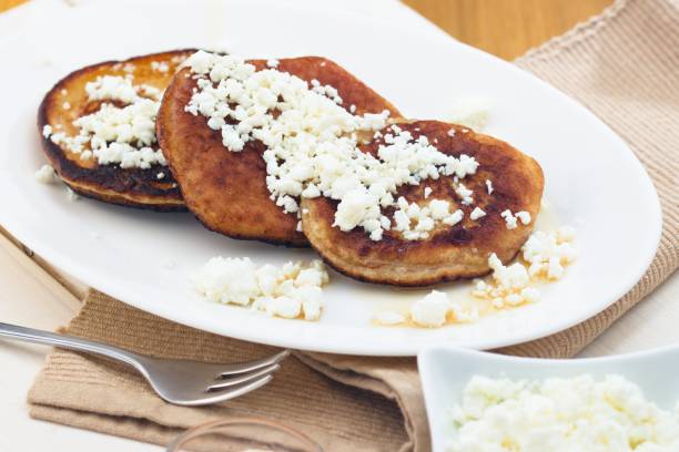 istock Pancakes or crumpets with cottage cheese and syrup 866204372