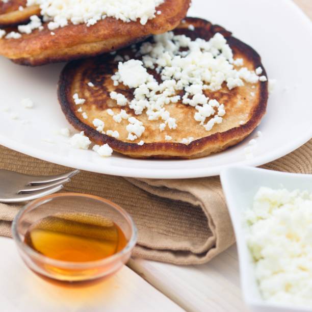 istock Pancakes or crumpets with cottage cheese and syrup 866204386