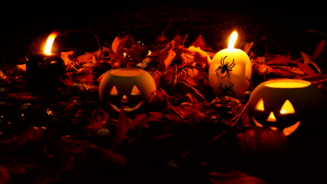 Halloween Pumpkin Head Jack Lantern with Autumn Leafs