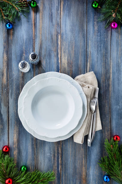 istock table setting for the new year and Christmas. empty plate and glass 866211034