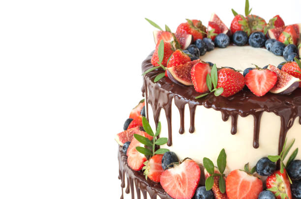istock Cake in chocolate, decorated with berries. 866213346