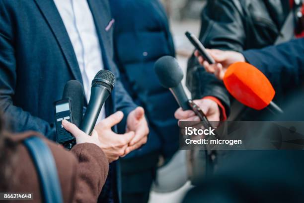 Interviewing Businessman Or Politician Press Conference Stock Photo - Download Image Now