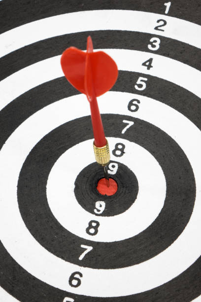 Target with arrow in the center on a white background
