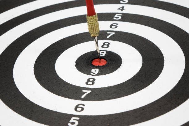 istock Target with arrow in the center on a white background 866219230