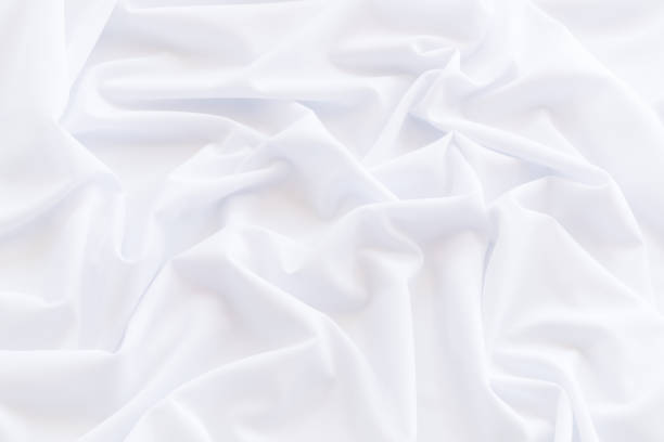 istock White cloth background and texture, Crumpled of white fabric abstract 866227666