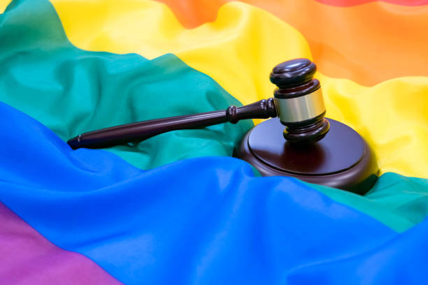 istock Hammer and gavel again against rainbow flag 866236412