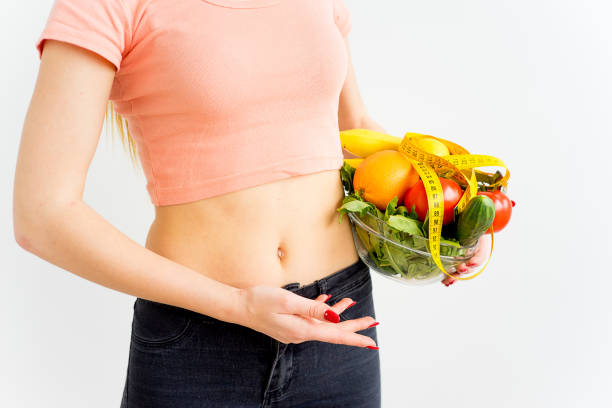 istock Woman eating healthy 866237388