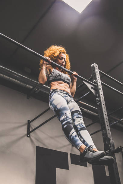 istock Red-haired girl with athletic physique during workout 866237842
