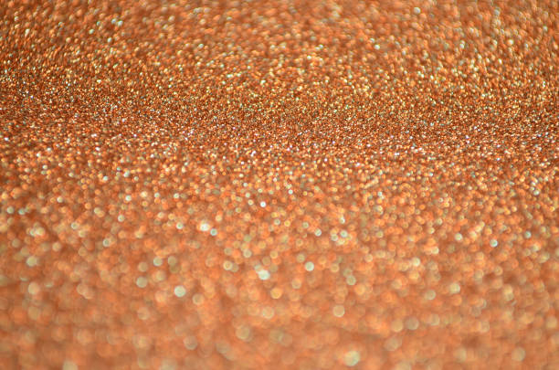istock Abstract orange gold carborundum bokeh background 866241040
