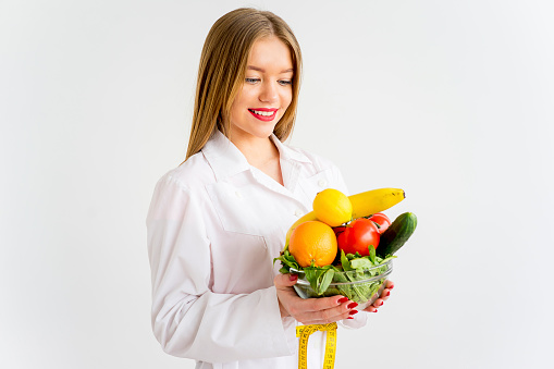 A woman eating healthy food on a diet