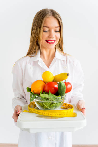 istock Woman eating healthy 866243290
