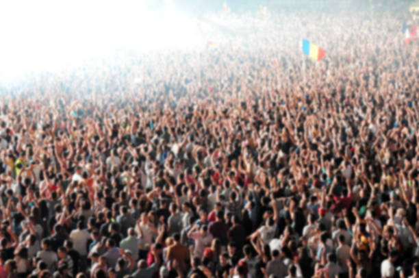 istock Blurred crowd of people partying 866247880