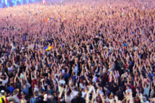 istock Blurred crowd of people partying 866247882