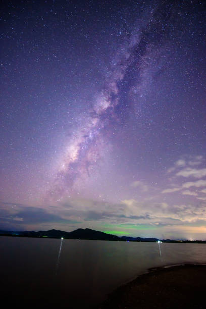 istock lake view with milky way on the sky 866254596