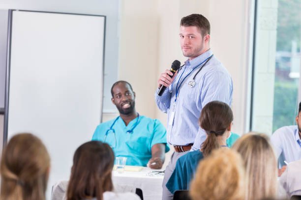 istock Confident male doctor participates in panel discussion 866255322