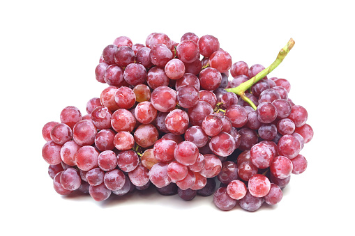 A big bunch of purple seedless grapes isolated