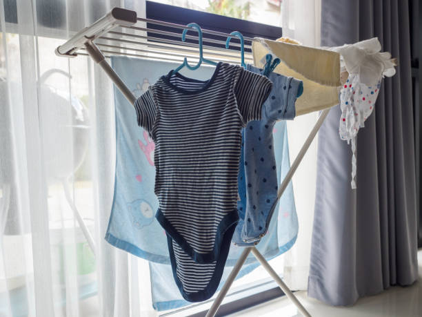 istock Hang up baby clothes in the house. 866256464