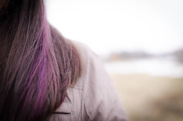 istock Woman violet hair closeup 866256564