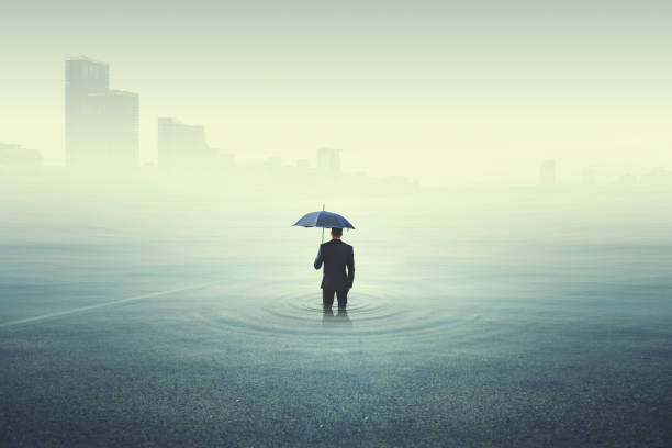 istock business man looking at the city underwater 866260788