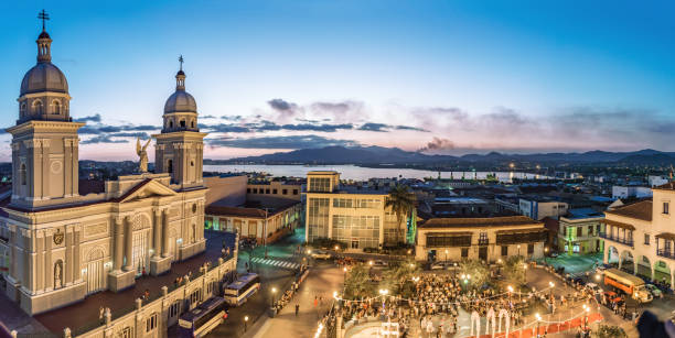 panoramic view over Santiago de Cuba bay with cathedral and harbour