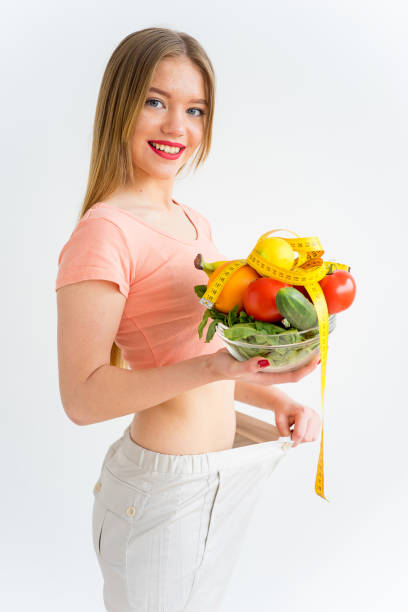 istock Woman losing weight 866261312