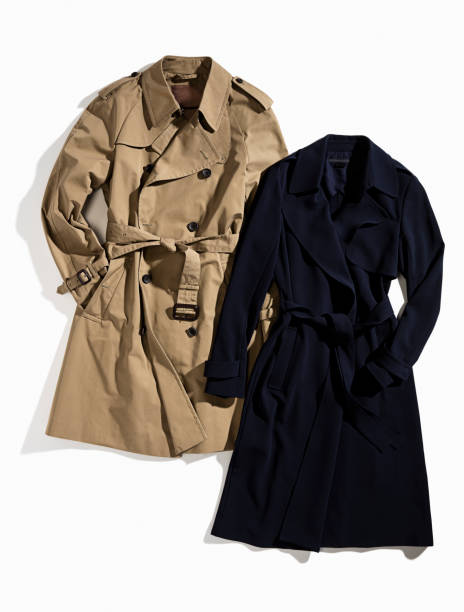 istock Trench coats isolated on white background 866265304
