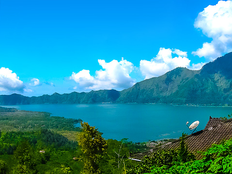 The Batur lake and volcano are in the central mountains in Bali near the Kintamani village, Indonesia.