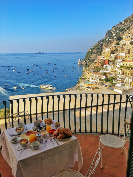 Breakfast on the balcony Breakfast on the balcony of a hotel in the City of Positano, Amalfi coast, Italy // mobile stock photo made with iPhone 6s amalfi food stock pictures, royalty-free photos & images