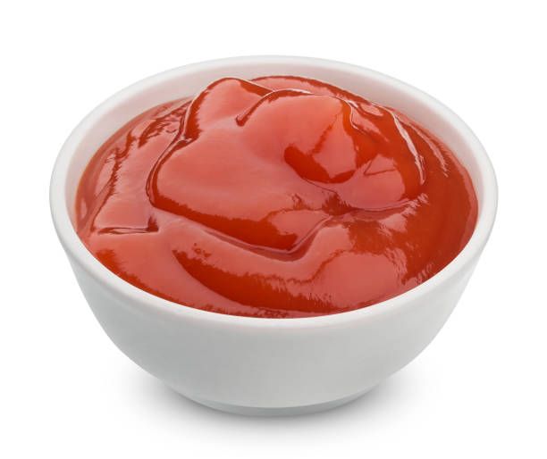 istock Bowl of ketchup isolated on white background 866286022