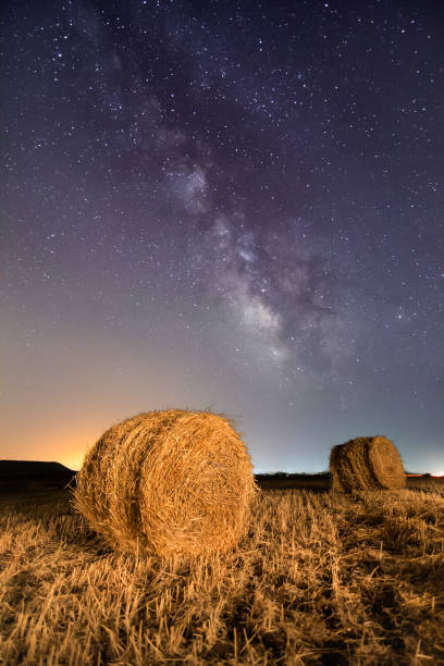 istock The Milky Way shines bright over a straw bales. 866287784