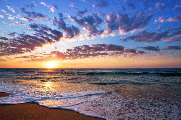 istock Brilliant ocean beach sunrise. Dramatic sky. Sunrise shot 866293342