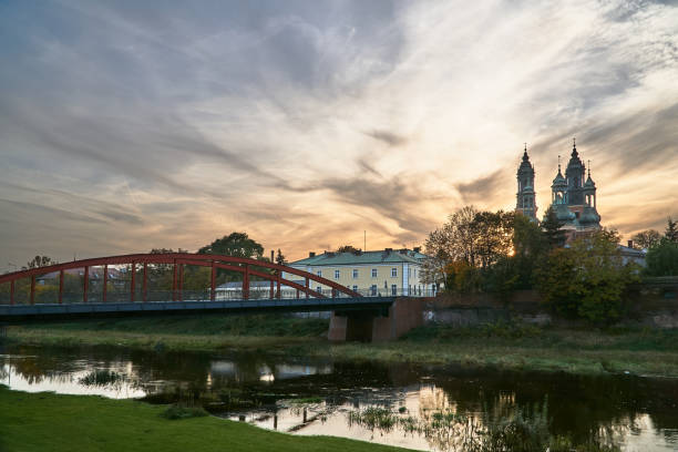 istock Urban landscape with river Warta and the cathedral towers 866293630