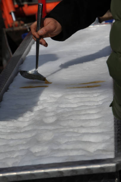 istock Maple taffy made by pouring maple syrup on snow. 866294074