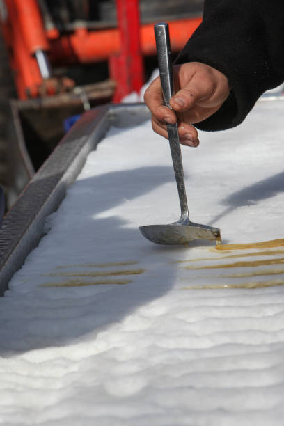 istock Maple taffy made by pouring maple syrup on snow. 866294078