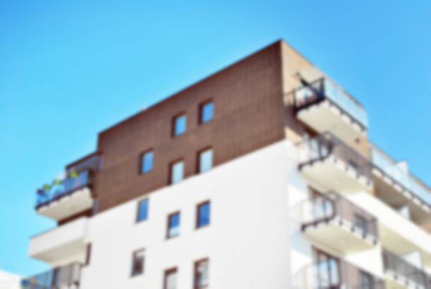 istock Abstract blur of modern apartment building. 866297466