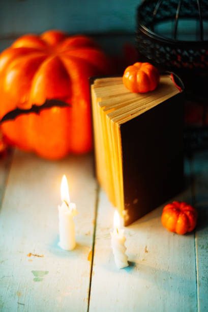 istock Halloween - Lanterns And Pumpkins On Wooden Table In A Haunted Forest 866303464