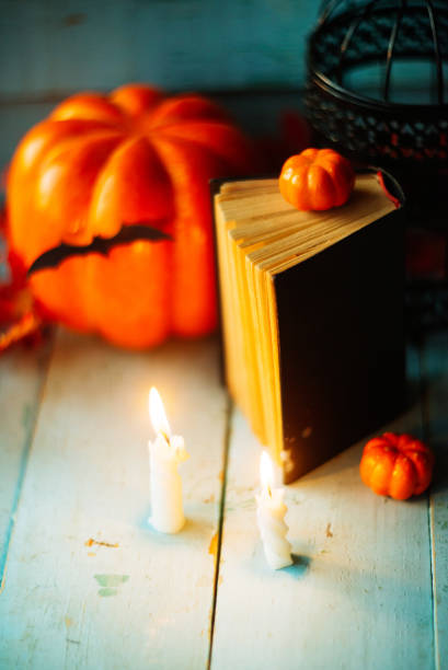 istock Halloween - Lanterns And Pumpkins On Wooden Table In A Haunted Forest 866303474