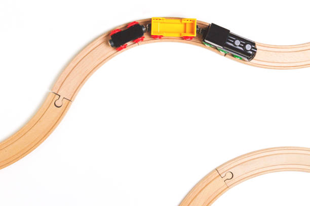 istock Toy train and wooden rails on white background. Top view. Copy space for text 866305676