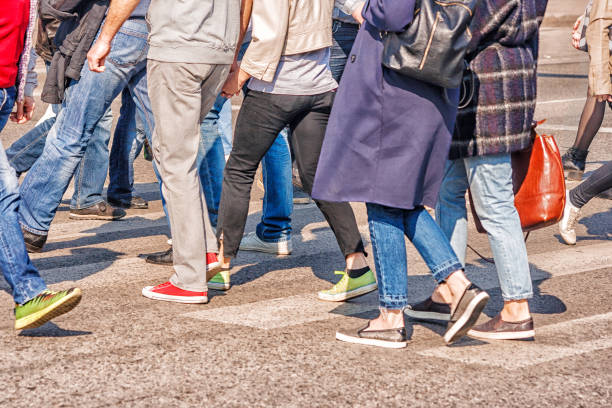 istock crossroad with walking pedestrians 866306230
