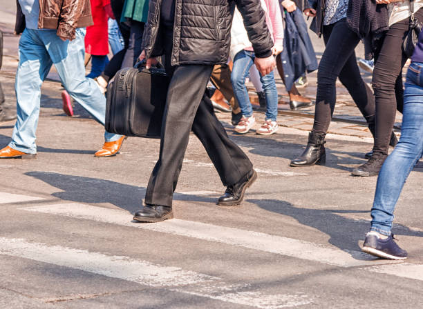 istock crossroad with walking pedestrians 866306622