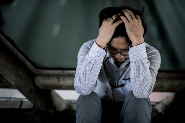business man is stressed from his work. depression and anxiety concept.