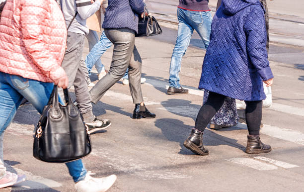 istock crossroad with walking pedestrians 866310262