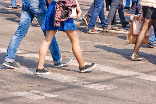 istock crossroad with walking pedestrians 866310440